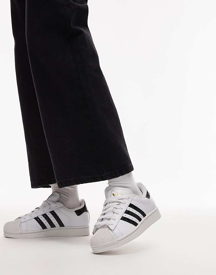https://images.asos-media.com/products/adidas-originals-superstar-ii-sneakers-in-white-and-snake-print-black/208661548-3?$n_750w$&wid=750&fit=constrain