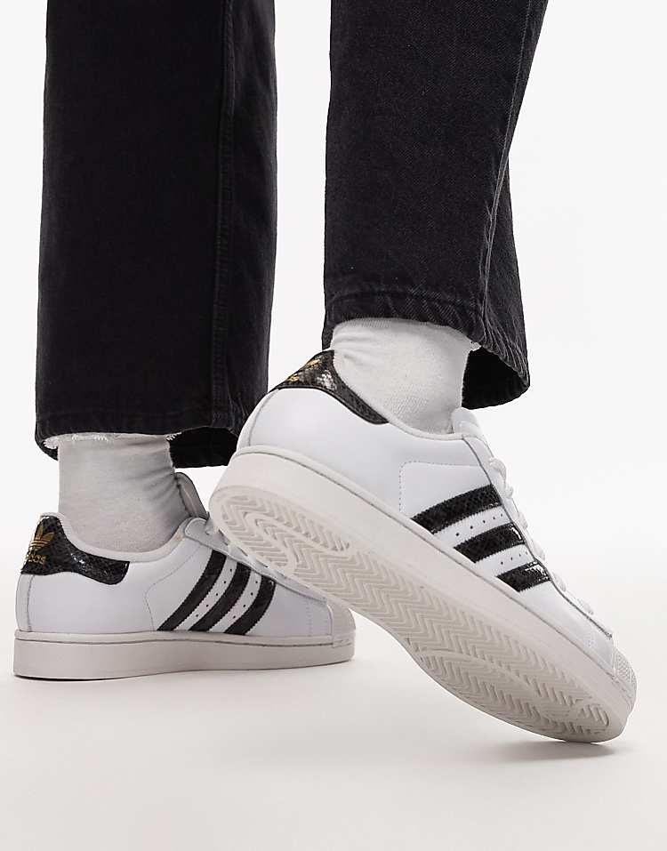 https://images.asos-media.com/products/adidas-originals-superstar-ii-sneakers-in-white-and-snake-print-black/208661548-5?$n_750w$&wid=750&fit=constrain