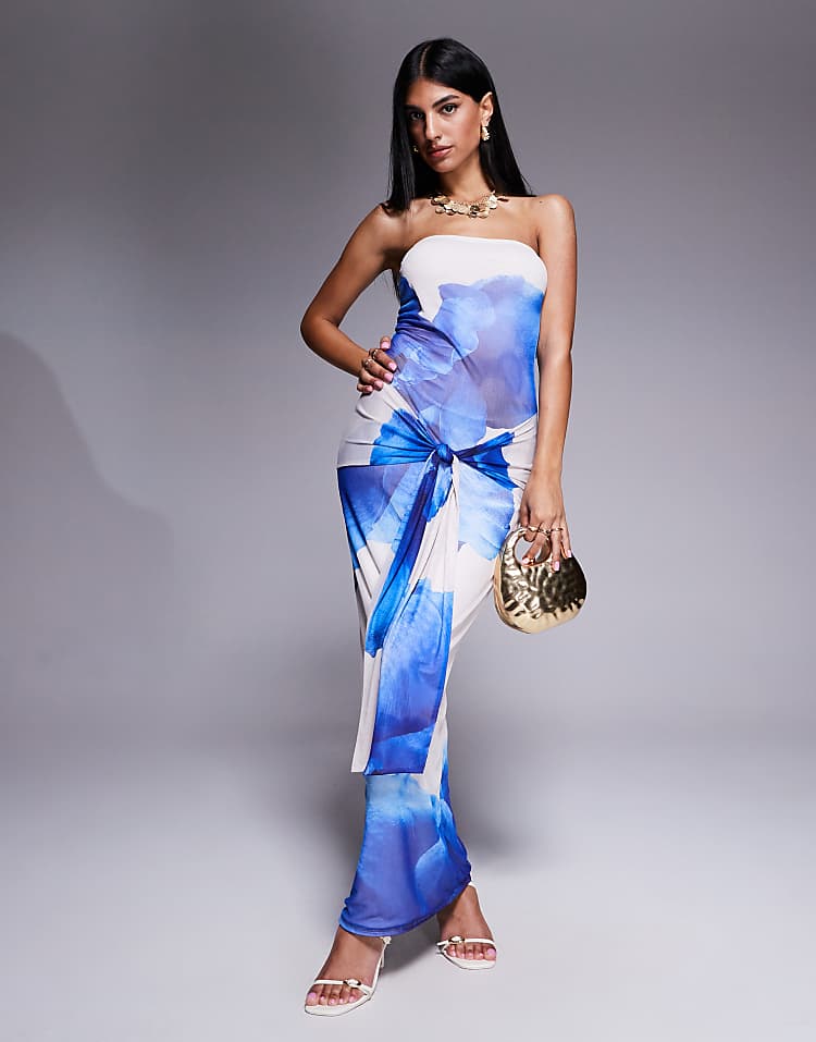 https://images.asos-media.com/products/kaiia-exclusive-double-layered-slinky-mesh-floral-tie-waist-drape-detail-maxi-dress-in-blue-and-ivory/208702704-1-blueandivory?$n_750w$&wid=750&fit=constrain