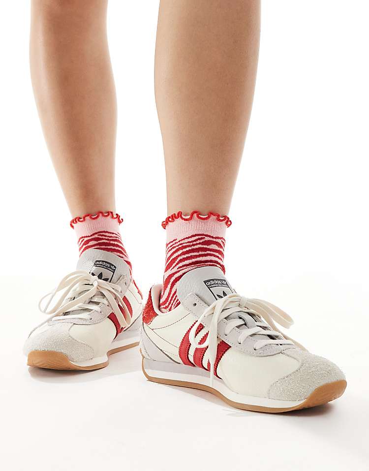 https://images.asos-media.com/products/asos-design-frill-top-socks-in-pink-and-red-zebra/208709456-3?$n_750w$&wid=750&fit=constrain