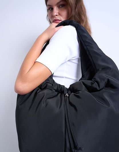 https://images.asos-media.com/products/topshop-sia-ruched-nylon-shoulder-bag-in-black/208737205-3?$n_750w$&wid=750&fit=constrain