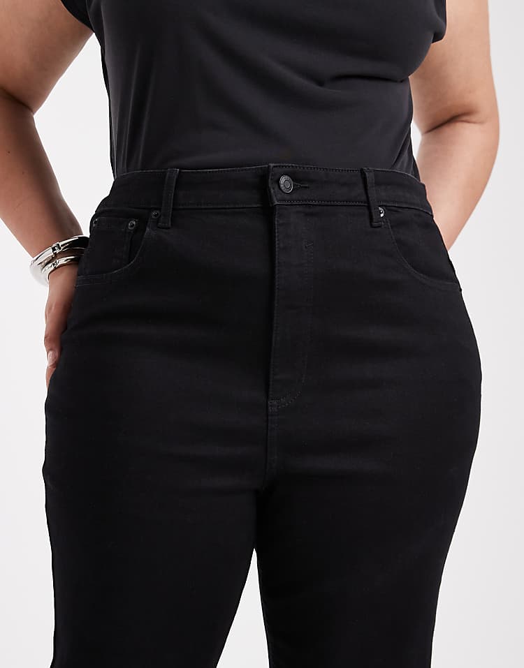 https://images.asos-media.com/products/asos-design-curve-power-stretch-sculpt-flare-jeans-in-black/208748934-5?$n_750w$&wid=750&fit=constrain