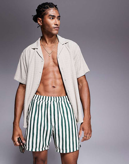 https://images.asos-media.com/products/asos-design-swim-shorts-in-mid-length-in-green-stripe/208750197-1-green?$n_750w$&wid=750&fit=constrain
