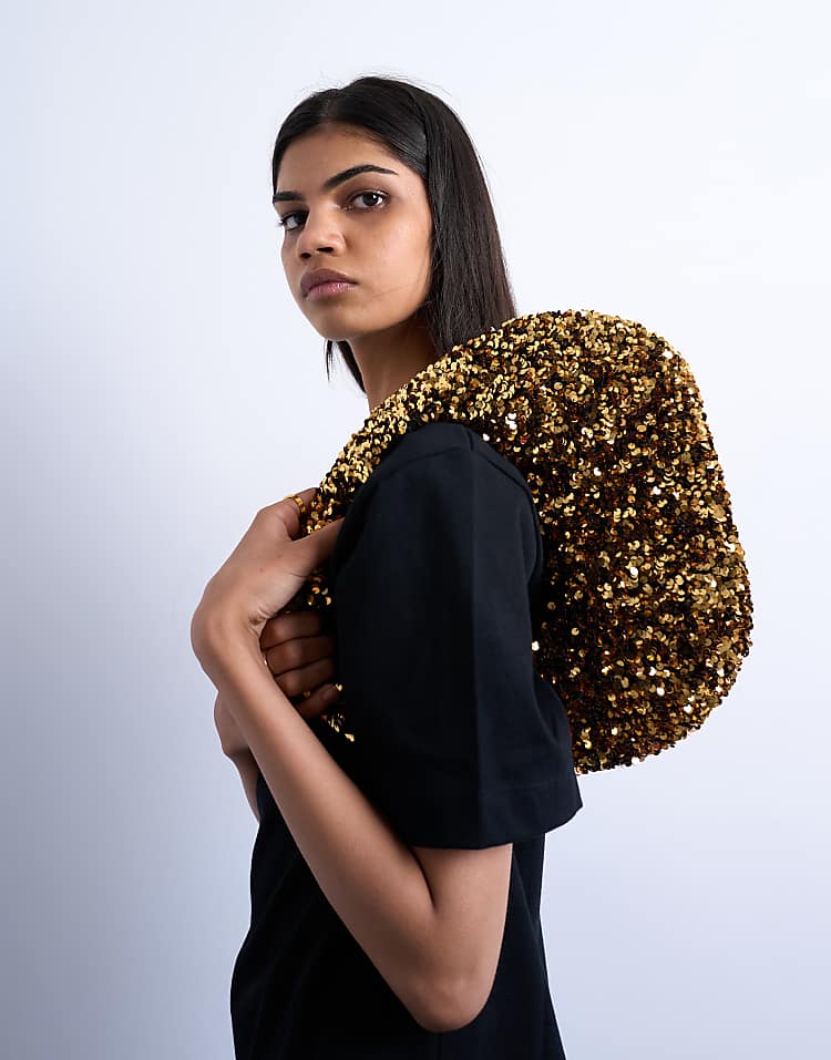 https://images.asos-media.com/products/topshop-santana-scoop-sequin-shoulder-bag-in-gold/208782101-3?$n_750w$&wid=750&fit=constrain