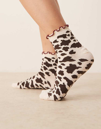 https://images.asos-media.com/products/asos-design-cow-print-socks-with-frill-top-in-cream-multi/208787037-3?$n_750w$&wid=750&fit=constrain