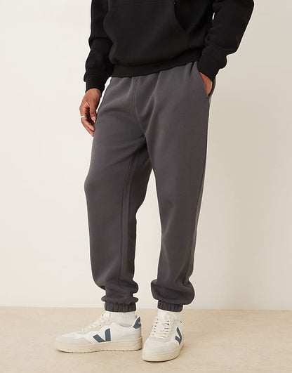 https://images.asos-media.com/products/asos-design-essential-tapered-sweatpants-in-washed-black/208788629-1-asphalt?$n_750w$&wid=750&fit=constrain