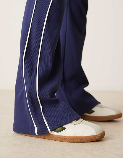 https://images.asos-media.com/products/asos-design-rib-knit-kick-flare-pants-with-piping-in-navy-and-cream/208865752-5?$n_750w$&wid=750&fit=constrain