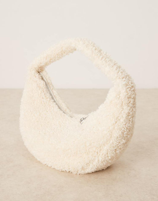 https://images.asos-media.com/products/calvin-klein-sherpa-half-moon-shoulder-bag-in-off-white/208894567-1-beige?$n_750w$&wid=750&fit=constrain