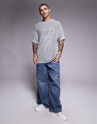 https://images.asos-media.com/products/liquor-n-poker-knit-jersey-top-with-rebel-13-logo-in-gray/208982369-2?$n_750w$&wid=750&fit=constrain