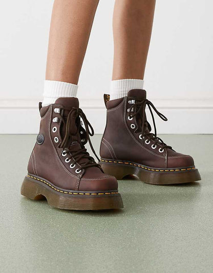 https://images.asos-media.com/products/dr-martens-buzz-8-eye-boot-in-dark-brown/209000271-1-brown?$n_750w$&wid=750&fit=constrain