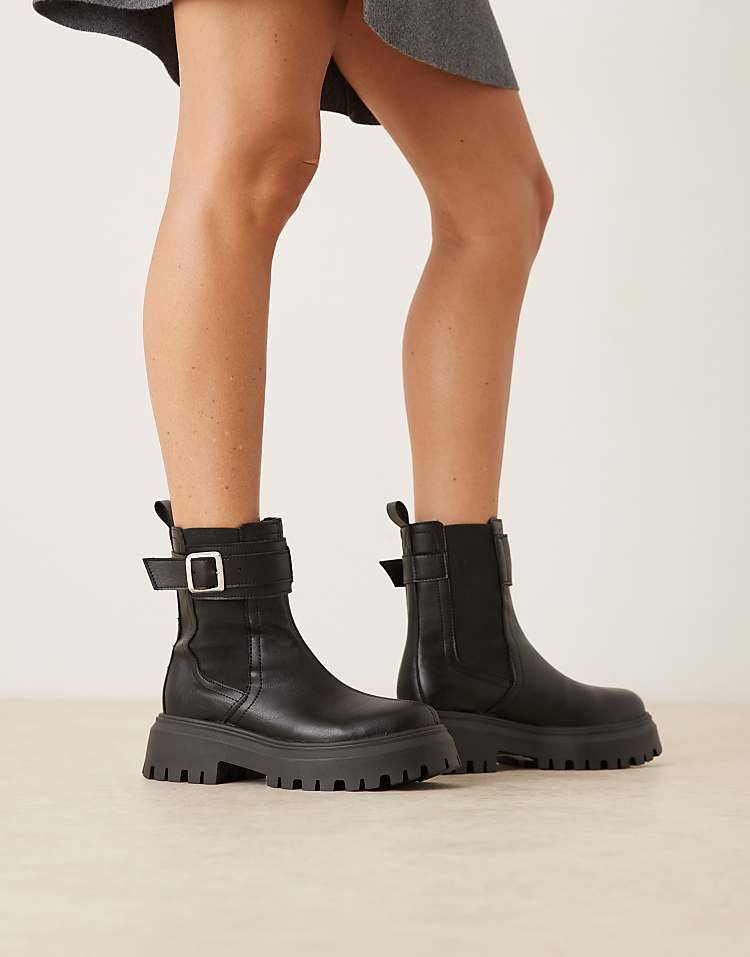 https://images.asos-media.com/products/asos-design-astrid-chunky-chelsea-boots-with-buckles-in-black-tumbled-pu/209006902-1-blacktumbledpu?$n_750w$&wid=750&fit=constrain