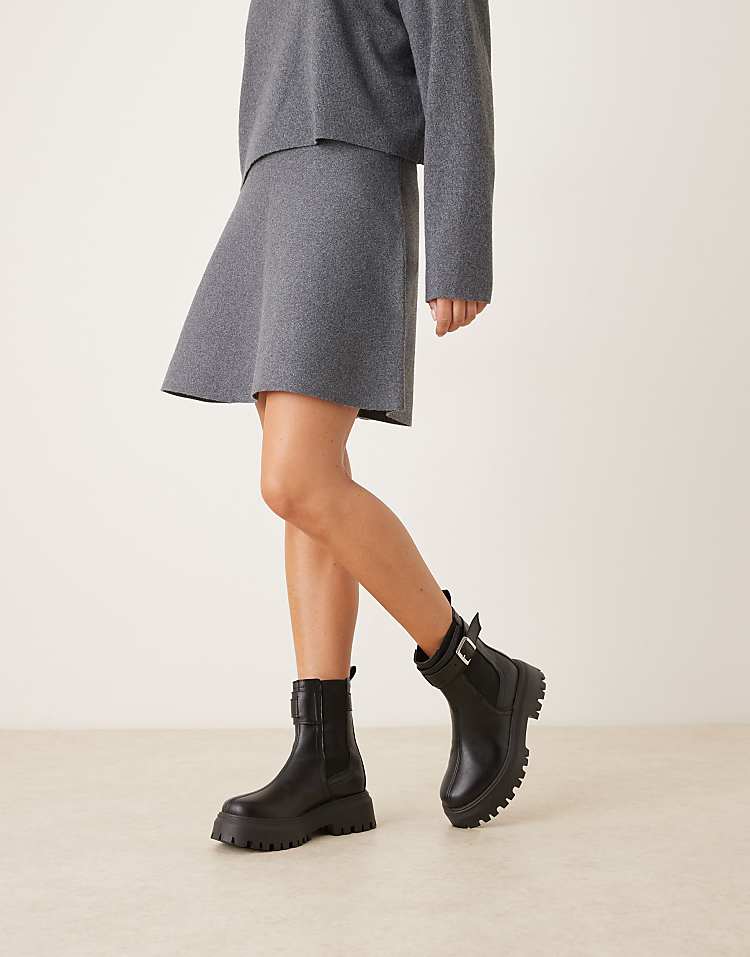 https://images.asos-media.com/products/asos-design-astrid-chunky-chelsea-boots-with-buckles-in-black-tumbled-pu/209006902-2?$n_750w$&wid=750&fit=constrain