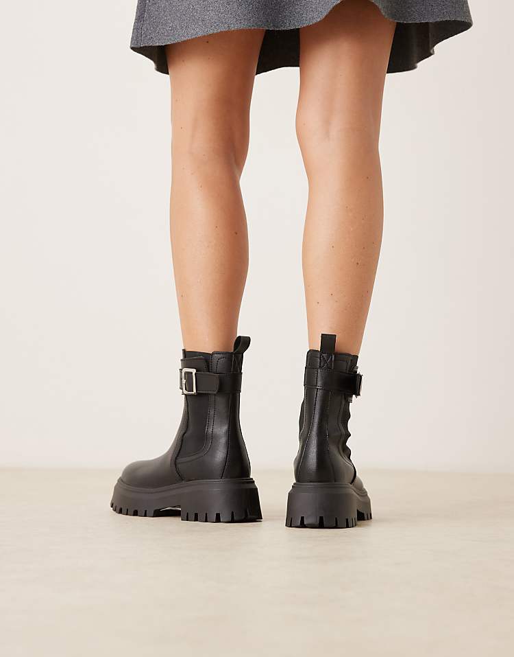 https://images.asos-media.com/products/asos-design-astrid-chunky-chelsea-boots-with-buckles-in-black-tumbled-pu/209006902-3?$n_750w$&wid=750&fit=constrain