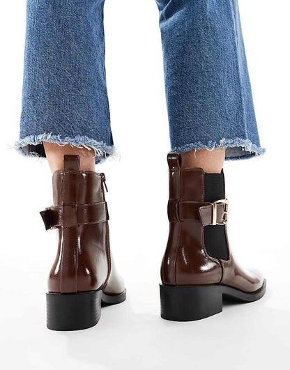 https://images.asos-media.com/products/schuh-cadie-buckle-detailing-heeled-chelsea-boots-in-brown/209022381-4?$n_750w$&wid=750&fit=constrain