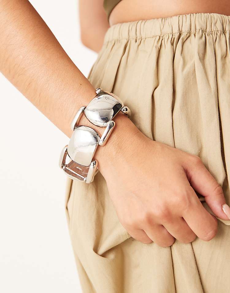 https://images.asos-media.com/products/asos-design-chunky-bracelet-with-vintage-style-design-in-silver-tone/209041817-3?$n_750w$&wid=750&fit=constrain