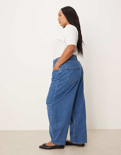 https://images.asos-media.com/products/asos-design-curve-high-waisted-barrel-leg-jeans-in-mid-blue/209072873-3?$n_750w$&wid=750&fit=constrain