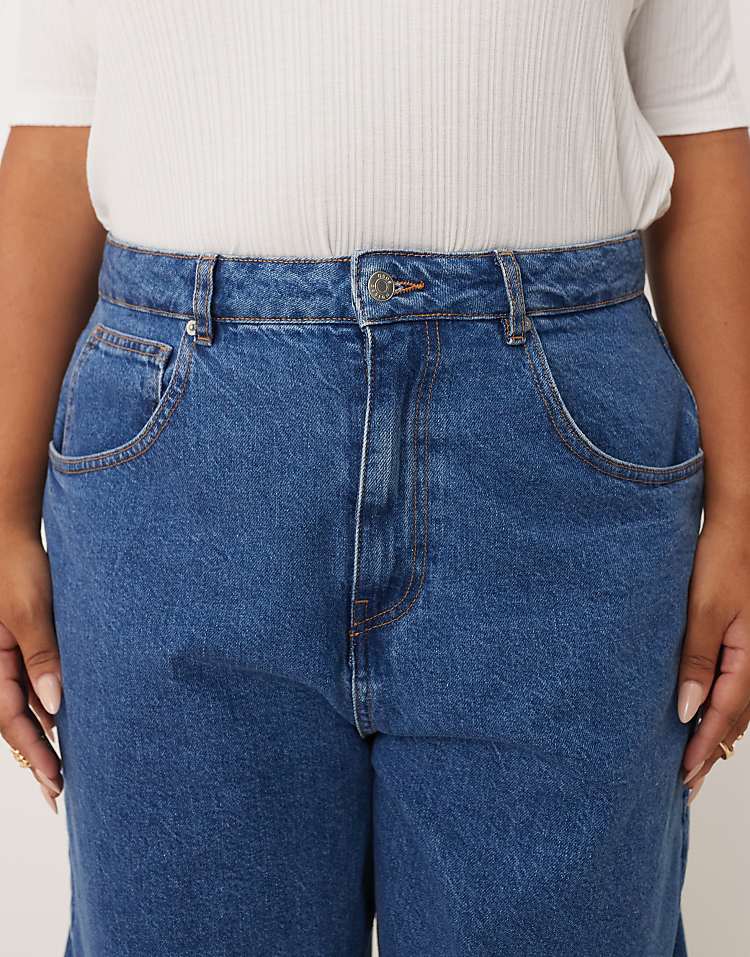 https://images.asos-media.com/products/asos-design-curve-high-waisted-barrel-leg-jeans-in-mid-blue/209072873-5?$n_750w$&wid=750&fit=constrain