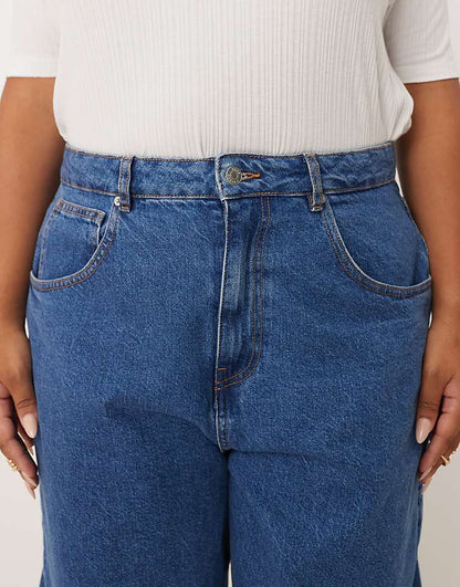 https://images.asos-media.com/products/asos-design-curve-high-waisted-barrel-leg-jeans-in-mid-blue/209072873-5?$n_750w$&wid=750&fit=constrain