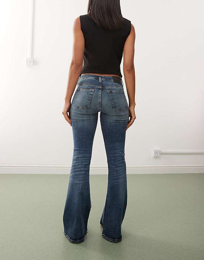 https://images.asos-media.com/products/weekday-katsumi-low-waist-flared-jeans-in-dark-blue-wash/209080664-2?$n_750w$&wid=750&fit=constrain