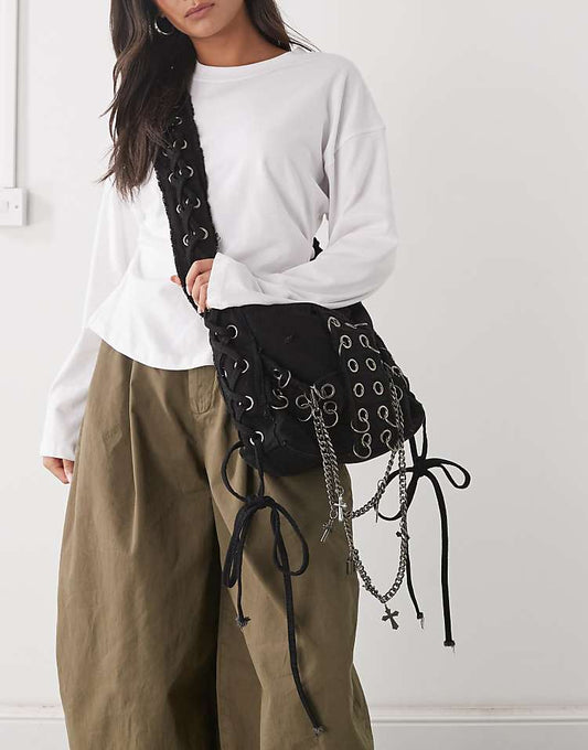 https://images.asos-media.com/products/minga-london-washed-twill-eyelet-cross-body-bag-in-black/209131618-1-black?$n_750w$&wid=750&fit=constrain