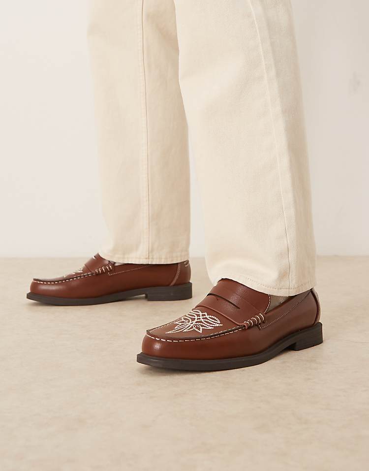 https://images.asos-media.com/products/asos-design-penny-loafers-in-brown-with-western-detailing/209210329-1-brown?$n_750w$&wid=750&fit=constrain