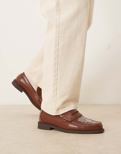 https://images.asos-media.com/products/asos-design-penny-loafers-in-brown-with-western-detailing/209210329-3?$n_750w$&wid=750&fit=constrain