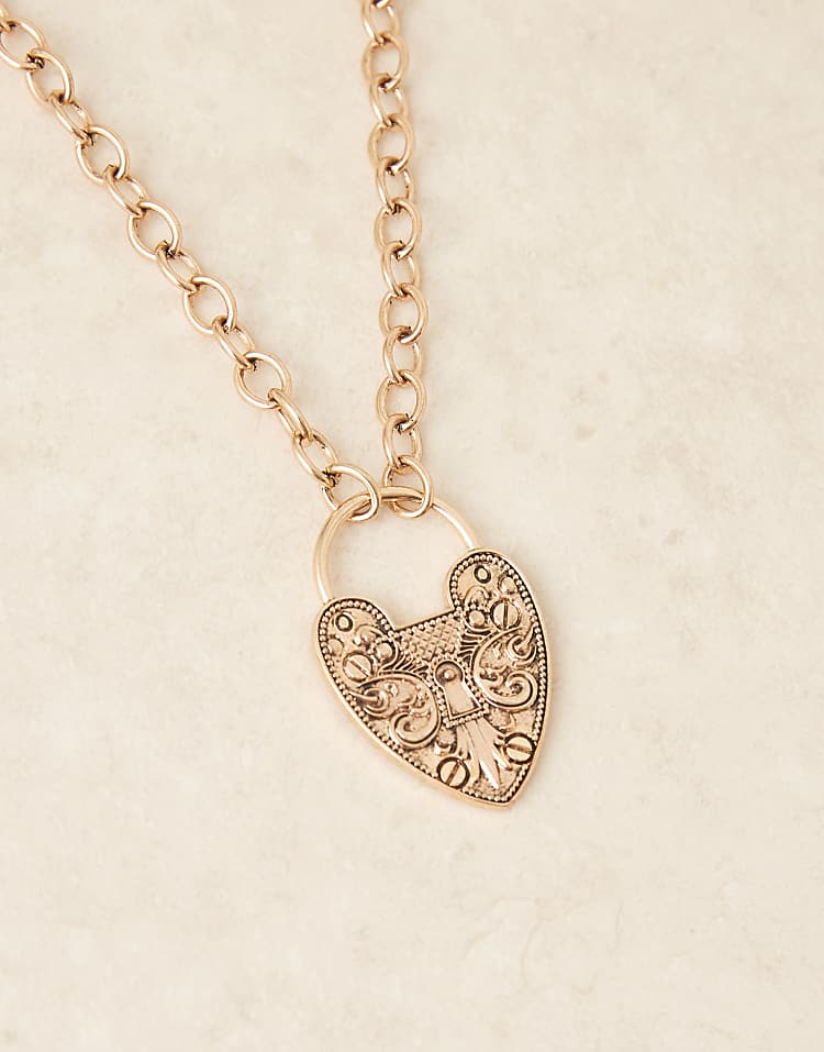https://images.asos-media.com/products/designb-london-statement-boho-heart-pendant-chain-necklace-in-gold-tone/209302255-2?$n_750w$&wid=750&fit=constrain
