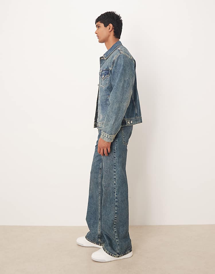 https://images.asos-media.com/products/asos-design-wide-flared-jeans-in-mid-wash-blue-with-yellow-tint-part-of-a-set/209454240-3?$n_750w$&wid=750&fit=constrain