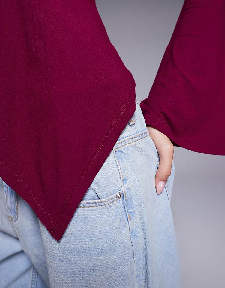 https://images.asos-media.com/products/asos-design-godet-insert-long-sleeve-top-with-fluted-sleeves-in-plum/209485511-2?$n_750w$&wid=750&fit=constrain