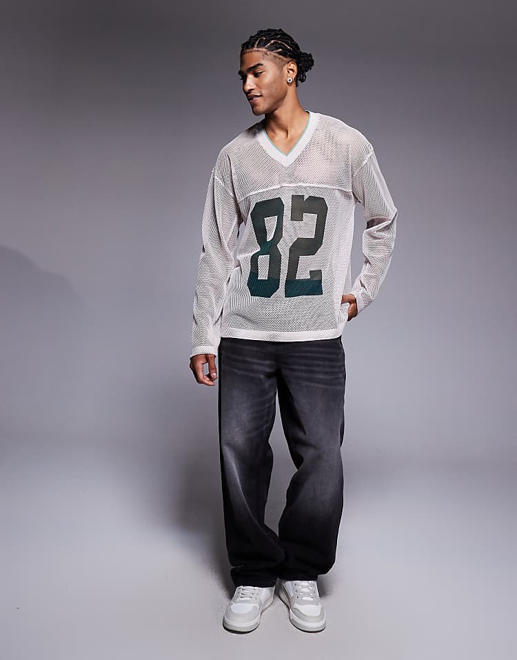 https://images.asos-media.com/products/asos-design-oversized-long-sleeve-t-shirt-with-v-neck-and-sports-graphic-in-beige-open-mesh/209495761-2?$n_750w$&wid=750&fit=constrain