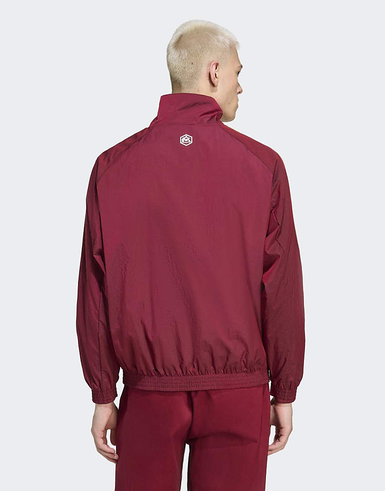 https://images.asos-media.com/products/adidas-originals-arsenal-terrace-icons-half-zip-jacket-in-team-coll-burgundy-2/209559813-2?$n_750w$&wid=750&fit=constrain
