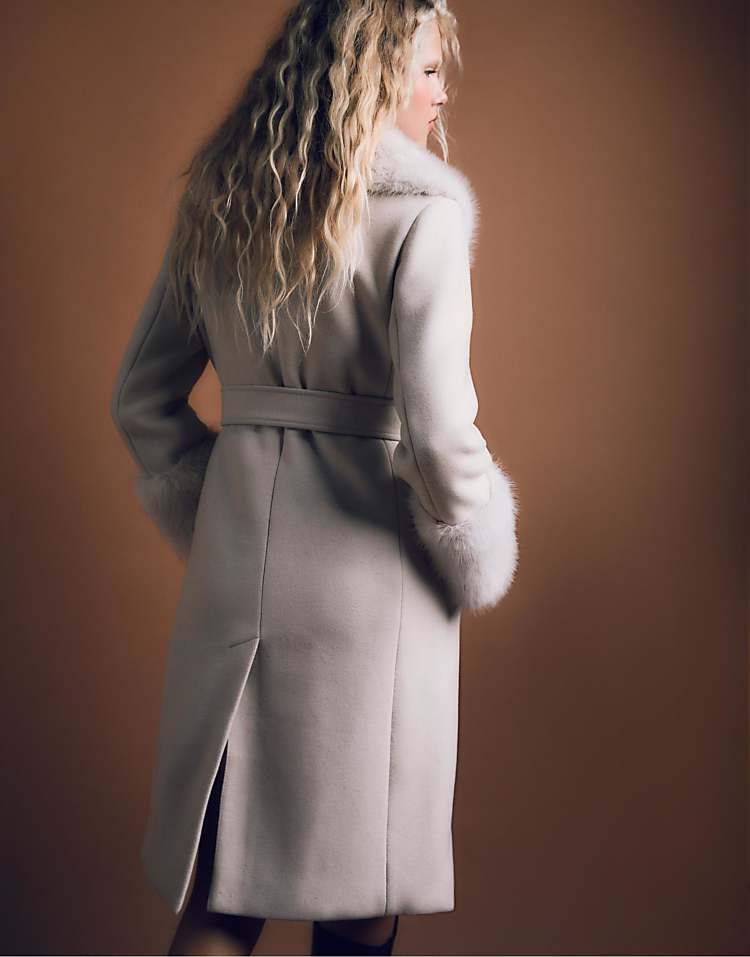 https://images.asos-media.com/products/stradivarius-long-coat-with-faux-fur-detail-in-ecru/209838533-3?$n_750w$&wid=750&fit=constrain