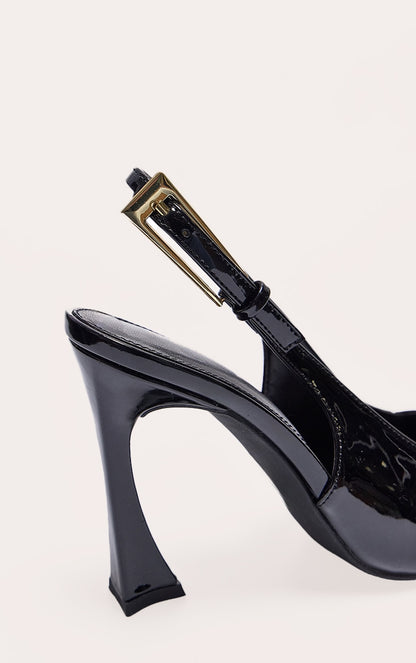 https://cdn-img.prettylittlething.com/2/7/0/4/2704a0443803b1739c8eddf128536a620ce515e8_CNJ8456_4_black_patent_pu_gold_buckle_high_stiletto_court_heels.jpg