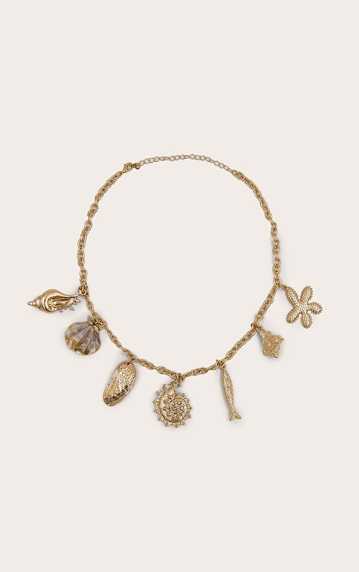 https://cdn-img.prettylittlething.com/4/2/0/e/420e791526e5c3c8bb79e88590c3896bf2e3ac9f_CNO2975_2_gold_multi_shell_pendant_chain_necklace.jpg