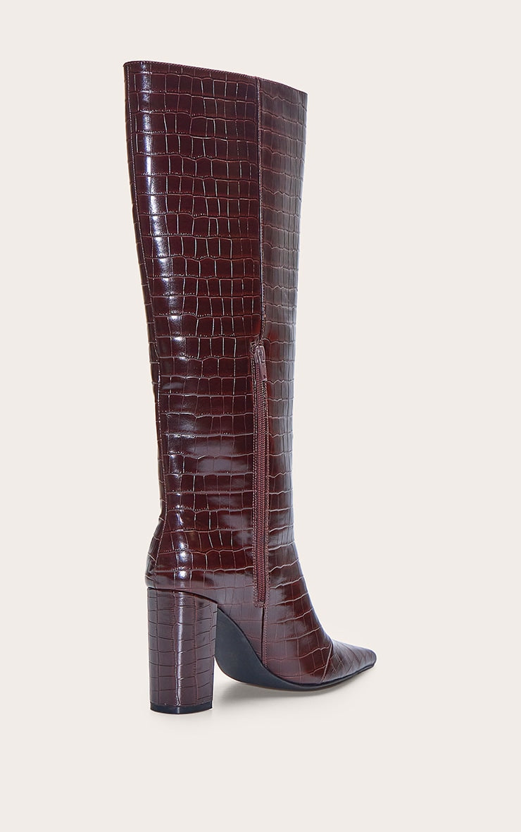 https://cdn-img.prettylittlething.com/4/9/8/e/498e07a7e46619452f48339ed477538ee8725bdc_CNN8826_4_chocolate_croc_point_toe_block_heel_knee_high_boot.jpg