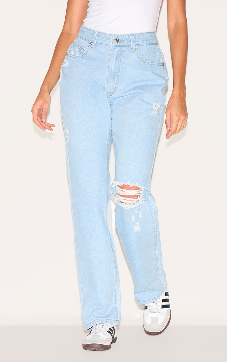 https://cdn-img.prettylittlething.com/4/f/5/3/4f5319fcb92d397fddf93ae8f88b25a2d985fbf8_CNL6883_2_light_blue_wash_distressed_high_rise_straight_leg_jeans.jpg