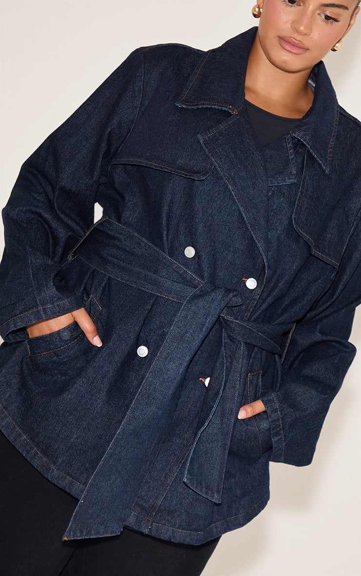 https://cdn-img.prettylittlething.com/5/2/e/0/52e055cb424bb7f86c58dea09e503ea4d8b975d1_CNN6034_4_plus_indigo_cropped_belted_denim_trench.jpg
