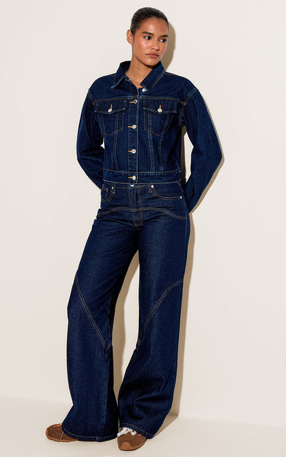 https://cdn-img.prettylittlething.com/6/8/4/b/684b1b091cd740a64d36f1d09c411f8a01069d05_CNN2896_1_indigo_western_seam_detail_jeans.jpg