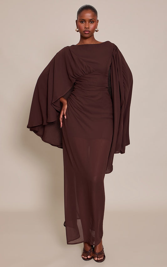 https://cdn-img.prettylittlething.com/8/7/d/d/87ddd88e4a30b23d1b0b1d2e695b66e205d8aafe_CNP0922_1_chocolate_chiffon_cape_detail_maxi_dress.jpg