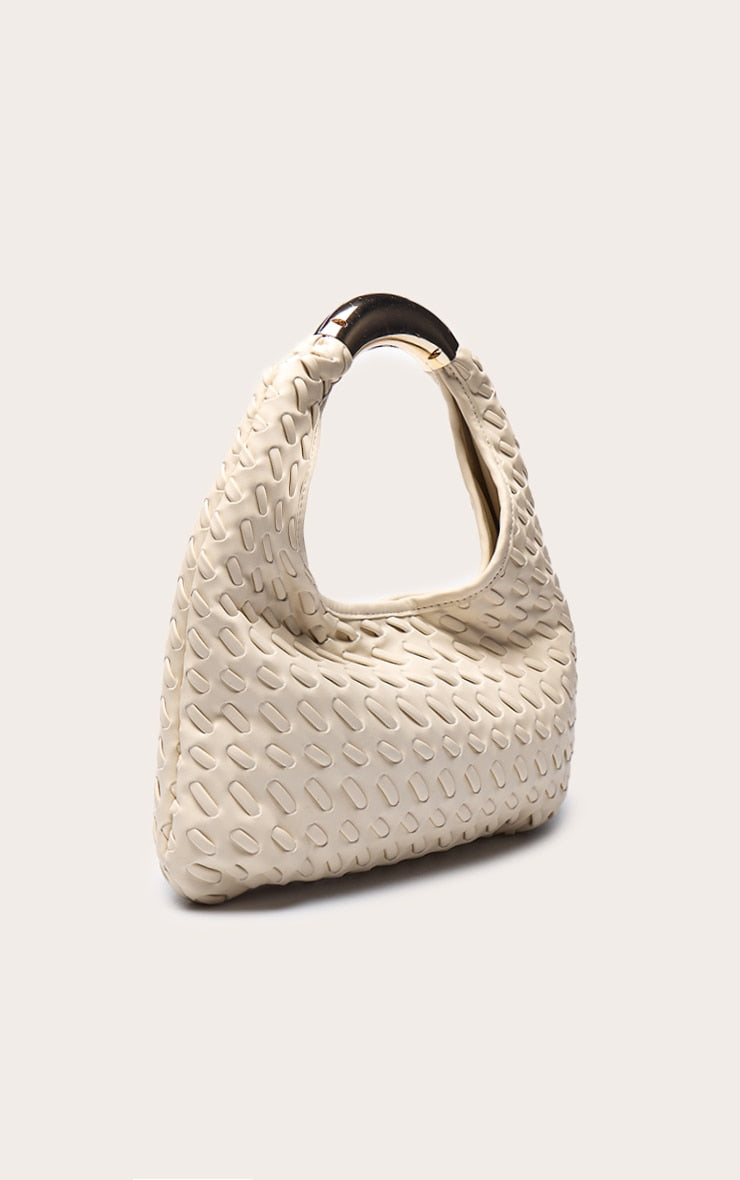https://cdn-img.prettylittlething.com/8/a/7/6/8a76e9301483475d7abdb678c66f4e66b546cc33_CNO2092_3_cream_weave_pu_metal_handle_shoulder_bag.jpg