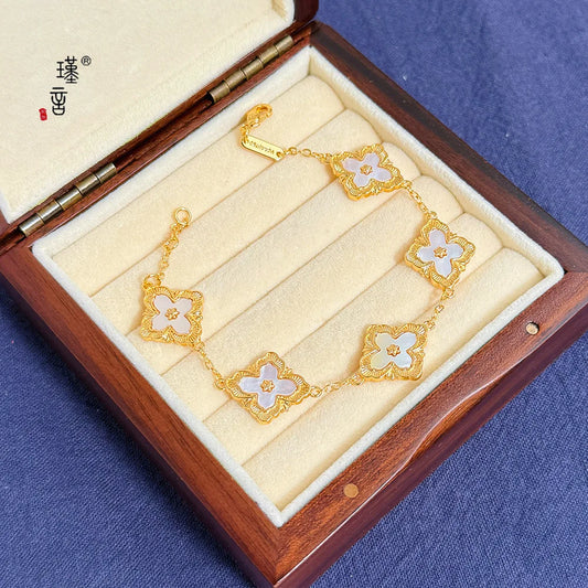 Gold Shop 24K real gold lucky grass bracelet ins niche design high-end au999 real gold bracelet new shell hand jewelry