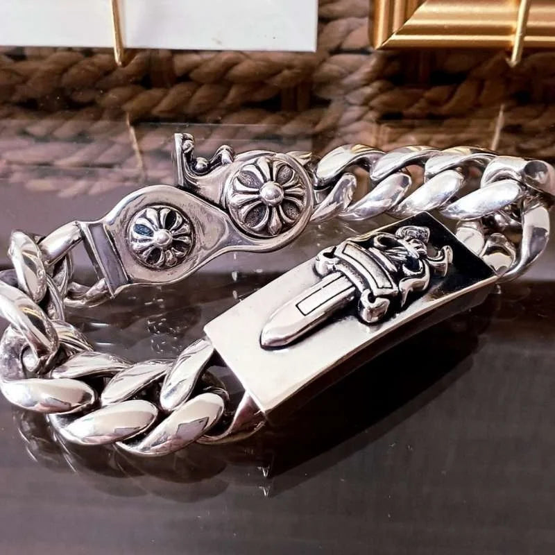 Silver Cuban Link Bracelet with Sword & Fleur-de-lis Accent: Bold Ornate Statement Jewelry