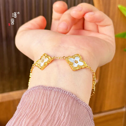 Gold Shop 24K real gold lucky grass bracelet ins niche design high-end au999 real gold bracelet new shell hand jewelry