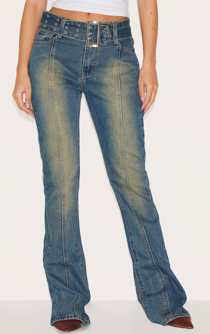 https://cdn-img.prettylittlething.com/a/2/5/f/a25f54392316f68825fdb99430f4212dd136e96e_CNA3231_2_indigo_vintage_wash_belted_seam_front_flare_jeans.jpg