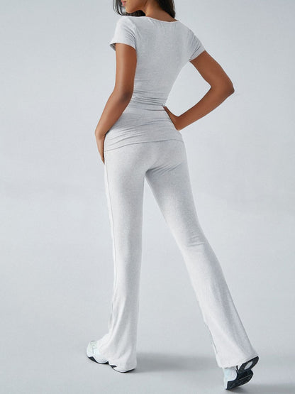 Devine Short Sleeve Top and Bootcut Legging Set Dark Blue / M Dark Blue / L Dark Blue / XL Dark Blue / M-Dark Blue / L-Dark Blue / XL-Black / S-Black / M-Light Gray / S-Black / L-Black / XL-Light Gray / M-Light Gray / L-Light Gray / XL-Blush Pink / S-Blush Pink / M-Blush Pink / L-Blush Pink / XL-Dark Blue / S-