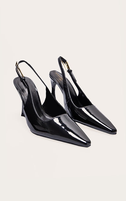 https://cdn-img.prettylittlething.com/a/e/7/1/ae71c8bdf369b2fb32a9880b464495c67c31b5b5_CNJ8456_2_black_patent_pu_gold_buckle_high_stiletto_court_heels.jpg