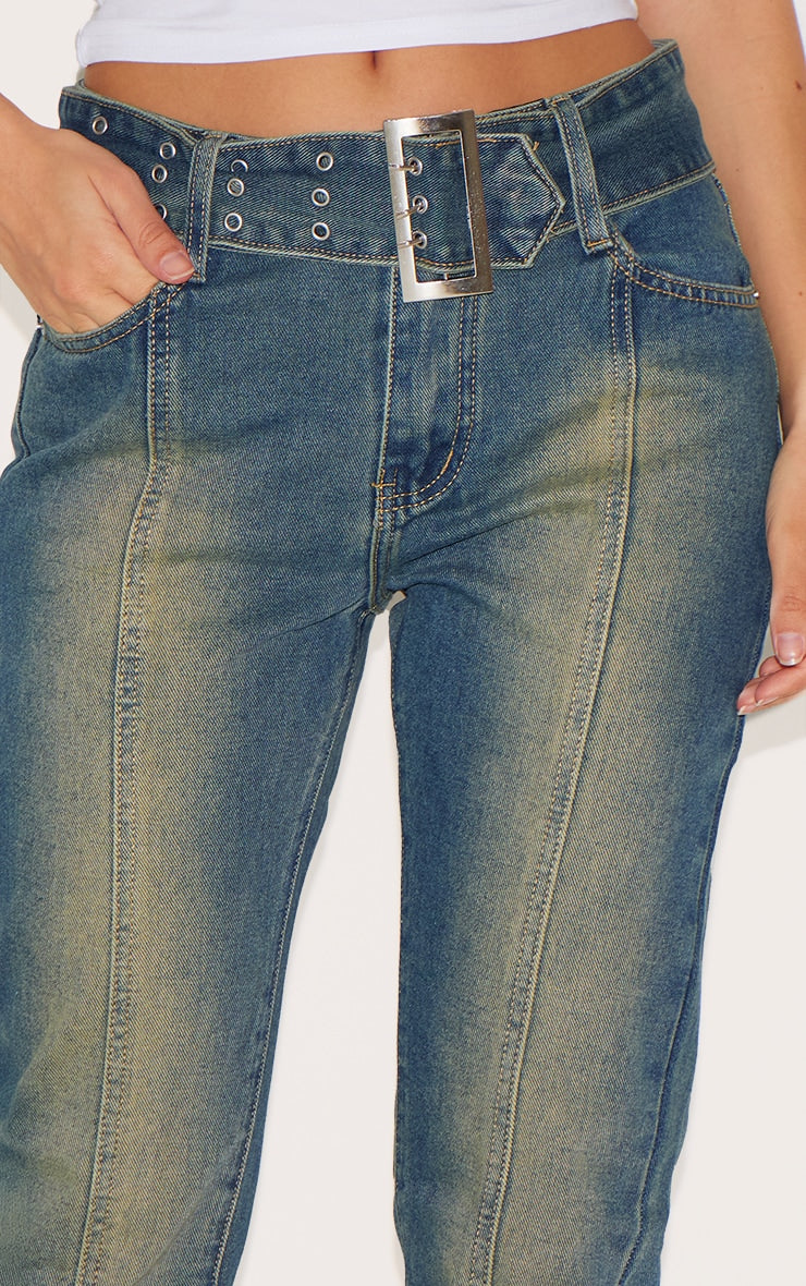 https://cdn-img.prettylittlething.com/b/7/2/3/b72371fcef634827e754dc71d2fe9edda31e53fa_CNA3231_4_indigo_vintage_wash_belted_seam_front_flare_jeans.jpg
