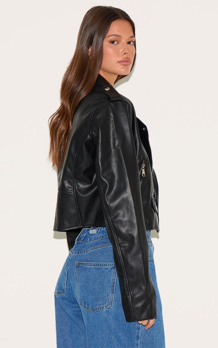 https://cdn-img.prettylittlething.com/c/8/9/9/c89971bfe3fbd4eaa801dbfd6af064247e290e2c_CNJ5347_2_black_basic_faux_leather_pocket_detail_biker_jacket.jpg