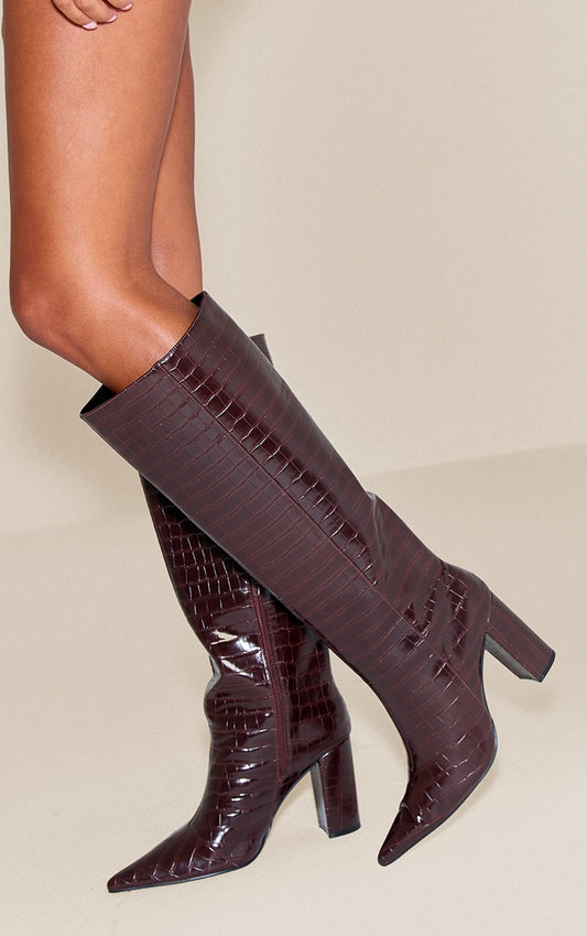 https://cdn-img.prettylittlething.com/c/f/b/8/cfb81a9f1c9329b3f0e81fb41be1ca3f5122458c_CNN8826_1_chocolate_croc_point_toe_block_heel_knee_high_boot.jpg
