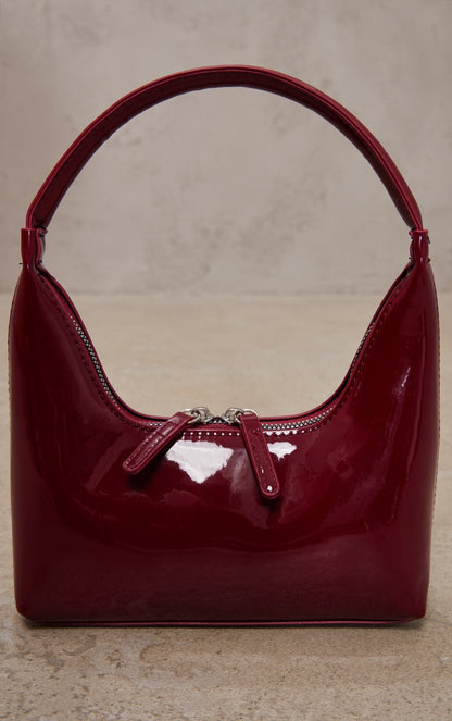 https://cdn-img.prettylittlething.com/d/5/5/7/d557645b1c20eaf8d6143426d3f3f77a055bc12e_CNH0025_3_burgundy_patent_simple_structured_double_zip_shoulder_bag.jpg